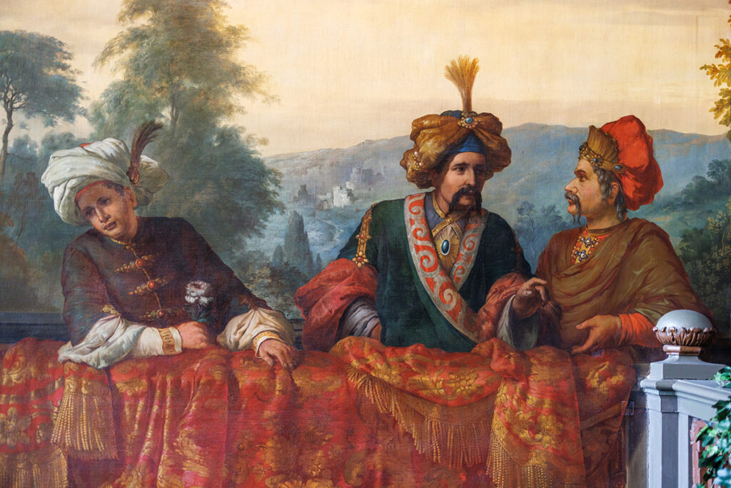 Paleis Het Loo sarayının duvar resminde yer alan geleneksel kıyafetli ve sarıklı üç Osmanlı figürü.